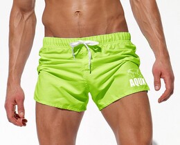 Фото - Чоловічі пляжні шорти AQUX салатового кольору - Men box