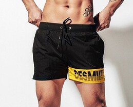 Фото - Плавательные шорты Desmit черные с брендовой надписью - Men box