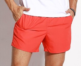 Фото - Мужские летние шорты от бренда Qike оранжевого цвета - Men box