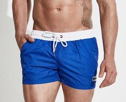 Фото - Мужские пляжные шорты Desmit синего цвета с белым поясом - Men box