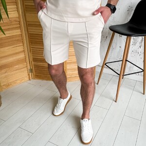 Фото - Бавовняні шорти світло-бежевого кольору Pobedov Nebo - Men box