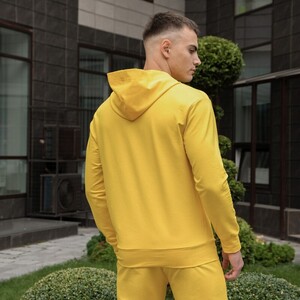 Фото - Трикотажне жовте худі Pobedov з чорною наклейкою "Герб" - Men box