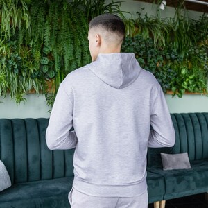 Фото - Патріотичне худі Pobedov з чорною наклейкою "Україна" - Men box