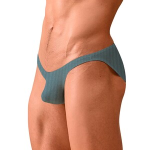 Фото - Однотонные трусы слипы Adannu бирюзового цвета - Men box