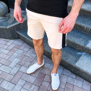 Фото - Бежевые мужские шорты Pobedov Lapsha с черными вставками - Men box