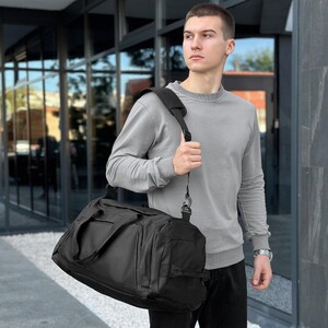 Фото - Дорожня сумка в чорному кольорі від Pobedov Road - Men box