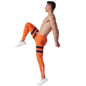 Фото - Чоловічі легінси AQUX. Колір помаранчевий. Артикул: 32-0036 - Men box
