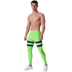 Фото - Чоловічі легінси AQUX. Колір салатовий. Артикул: 32-0038 - Men box