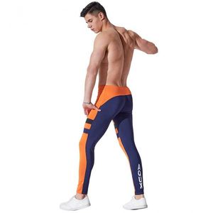 Фото - Чоловічі легінси AQUX. Колір помаранчевий. Артикул: 32-0049 - Men box