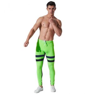 Фото - Чоловічі легінси AQUX. Колір салатовий. Артикул: 32-0050 - Men box