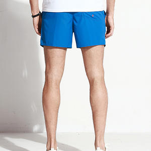 Фото - Плавательные шорты Qike. Цвет: синий - Men box