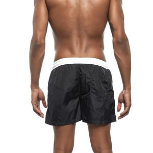 Фото - Мужские шорты UXH черного цвета - Men box