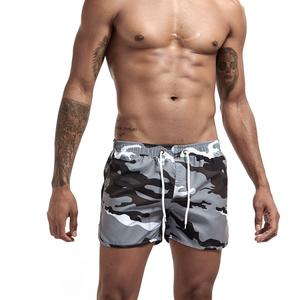 Фото - Камуфляжные мужские шорты от бренда UXH серого цвета - Men box