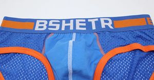 Фото - Мужские трусы в сеточку Bshetr синие с оранжевой окантовкой - Men box