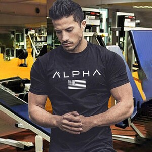 Фото - Футболка для спорту від бренду Alpha чорного кольору - Men box