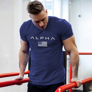 Фото - Спортивна футболка від бренду Alpha темно-синього кольору - Men box