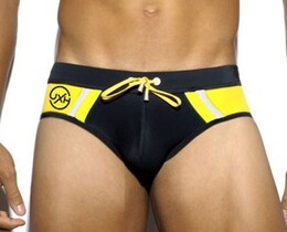 Фото - Плавки от бренда UXH черного цвета с желтыми вставками - Men box