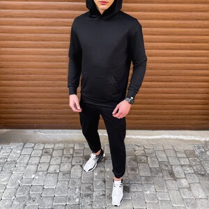 Фото - Спортивні штани Pobedov "95" чорні звуженого крою - Men box